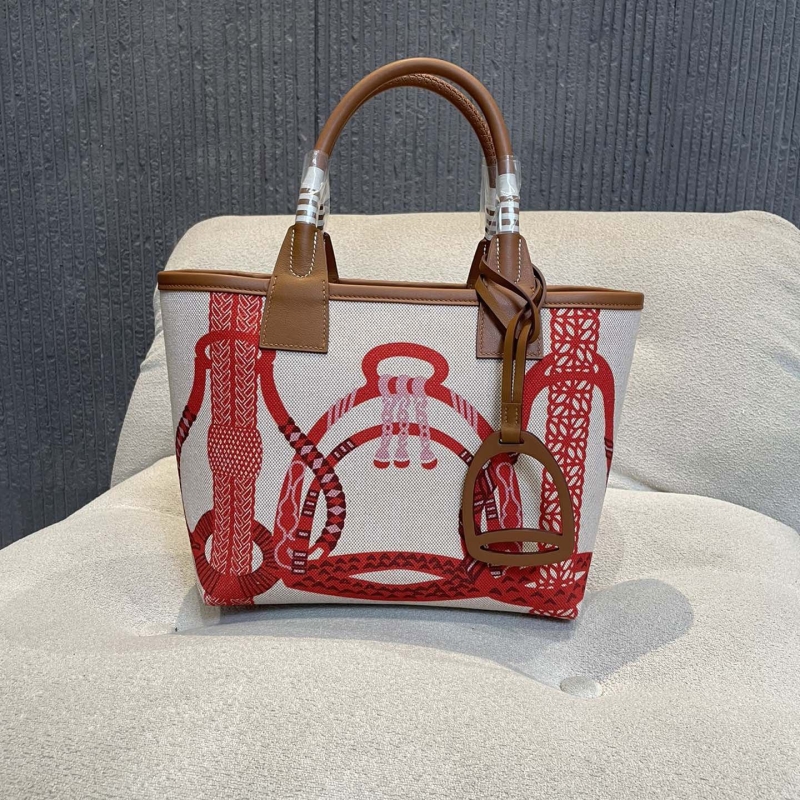 H**mes shopping bags